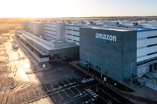 A huge Amazon warehouse found during a sunset